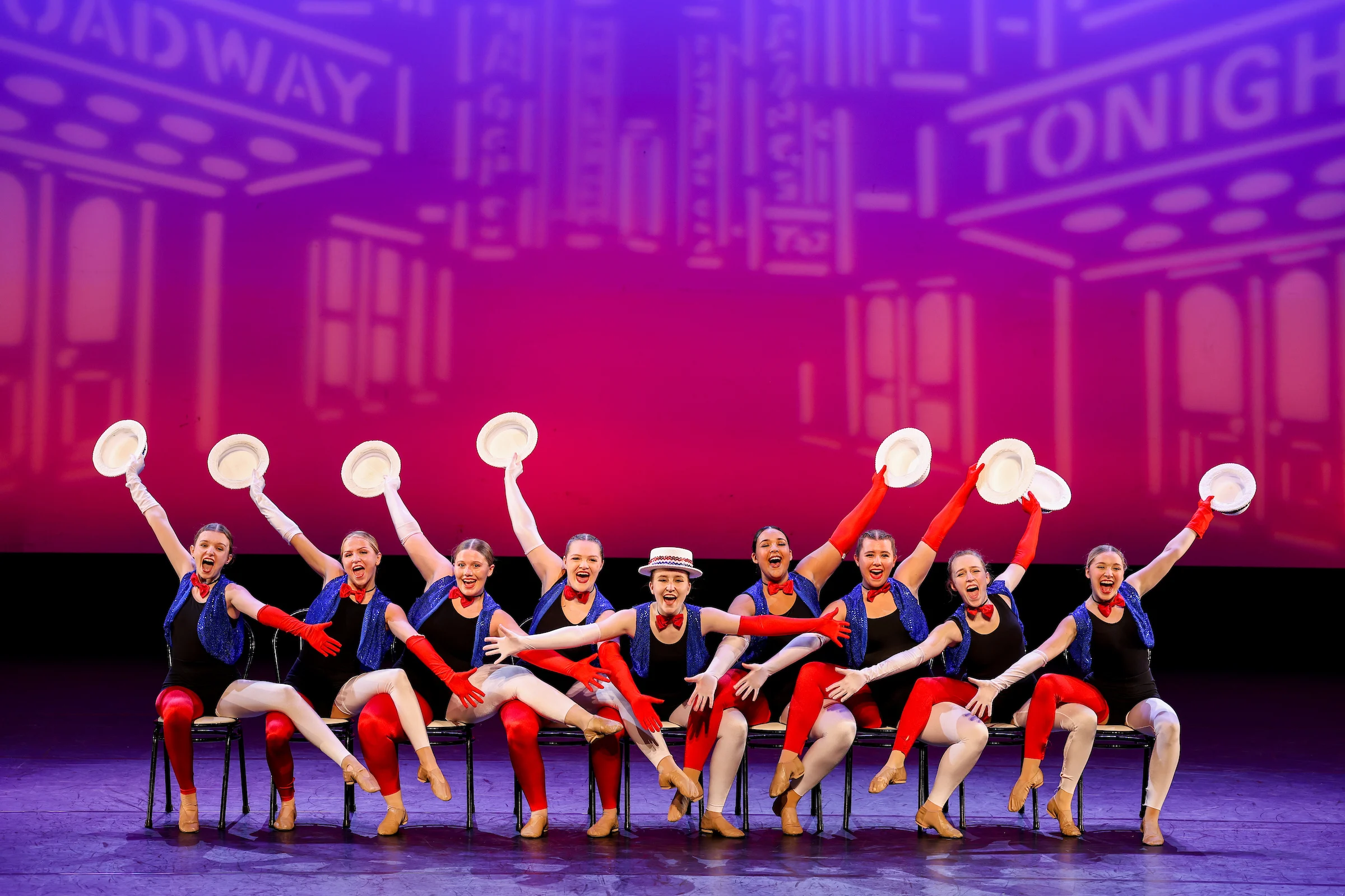 Group of CSP student dancers performing on stage during a performance.