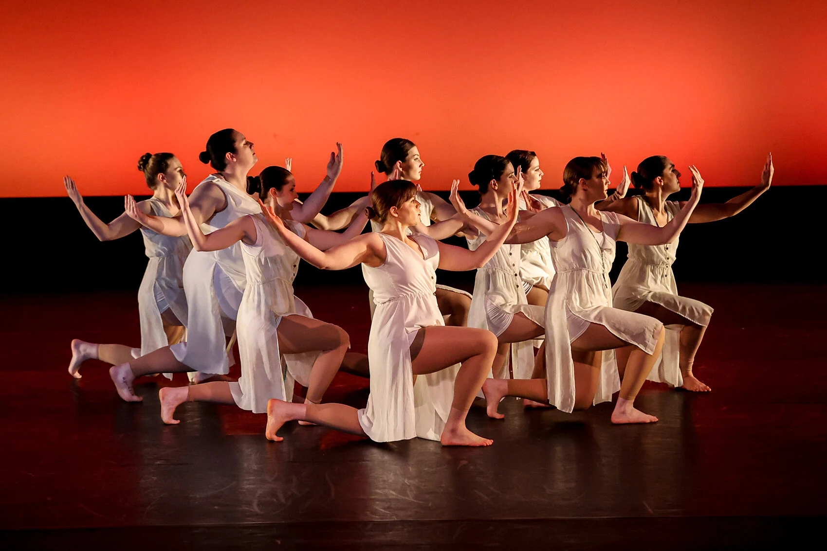 Group of performers dancing on a stage