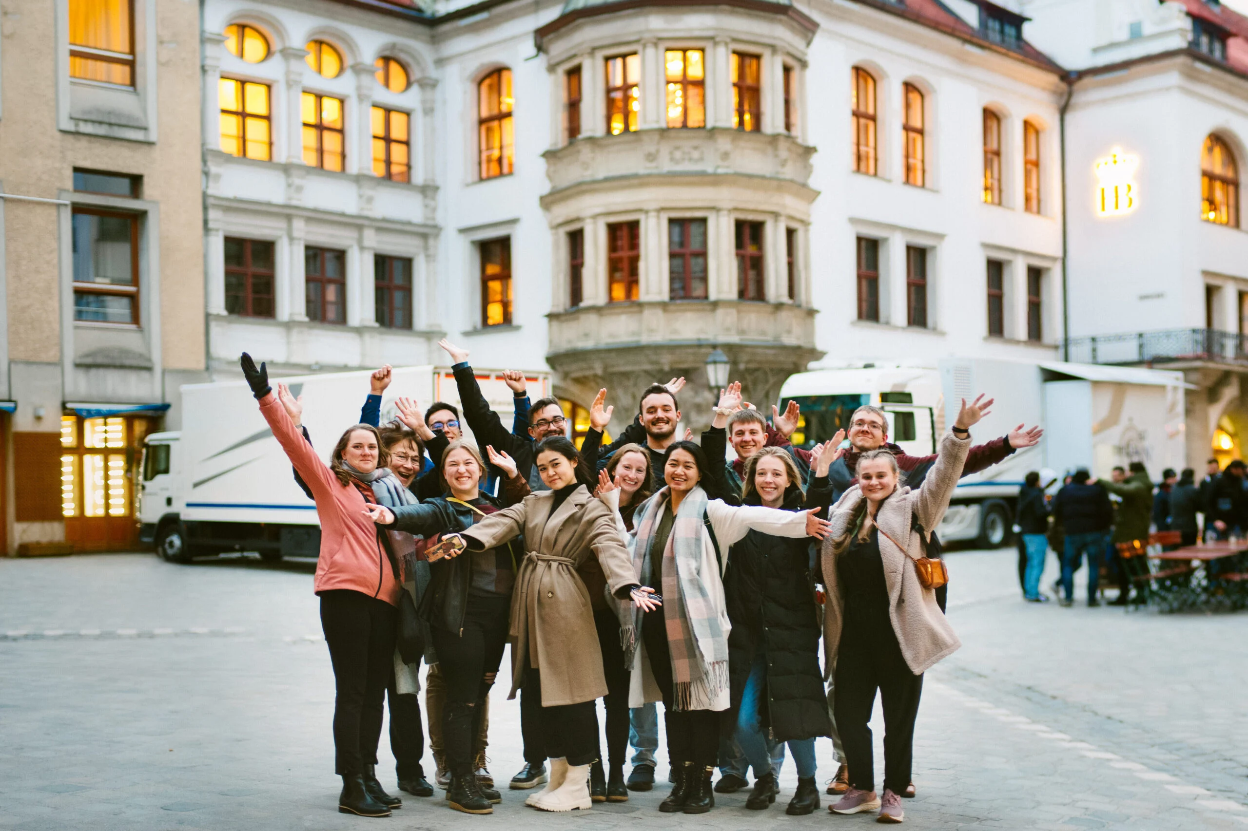 Group of students standing in a town square near Hofbraeuhaus