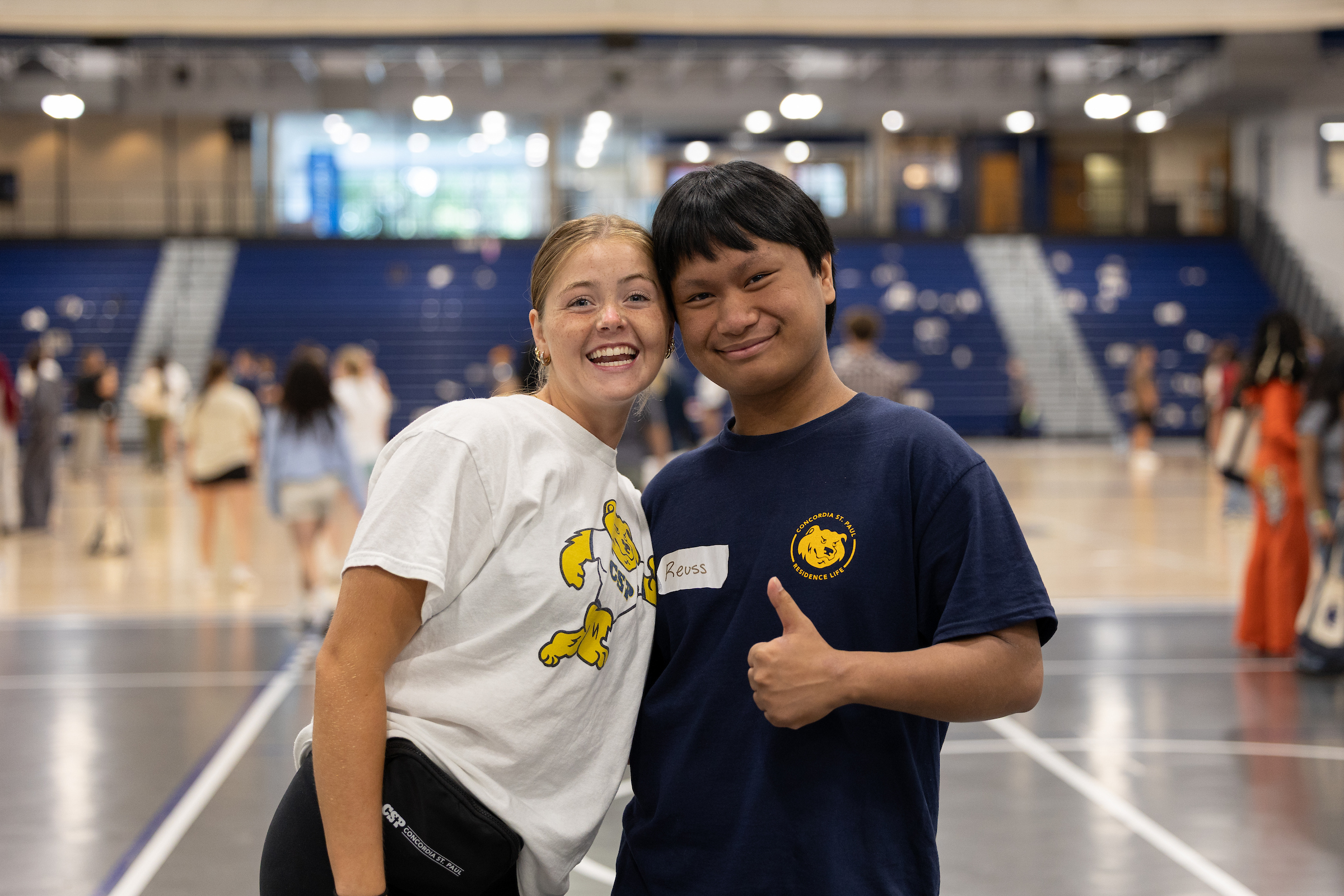 Two students at CSP orientation smiling.