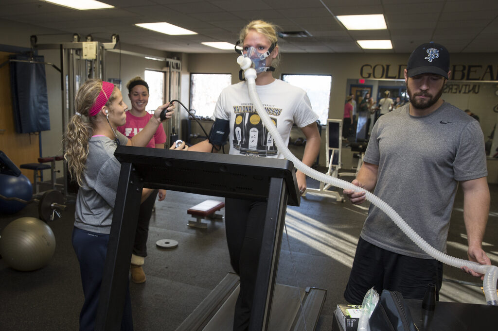 Doctor of Physical Therapy students running tests in a classroom setting.